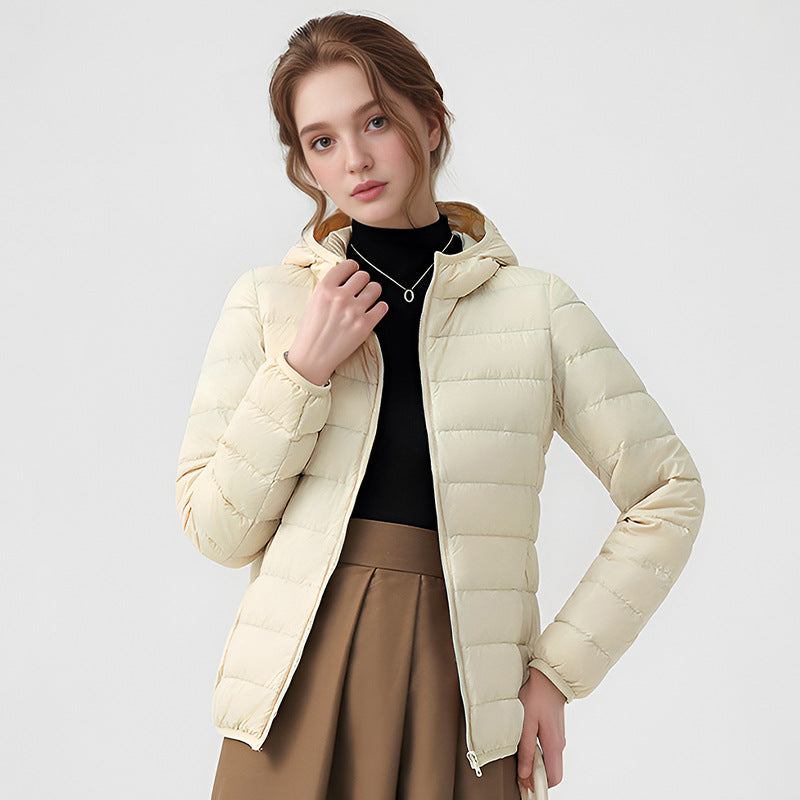 Women's off-white hooded down jacket with front zipper and horizontal quilting.