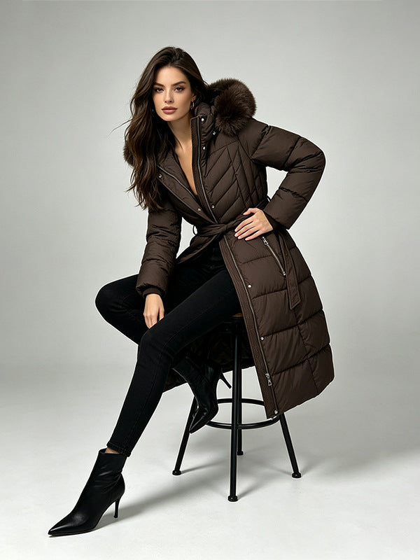 Women's long belted puffer coat with fur-trimmed hood, dark brown