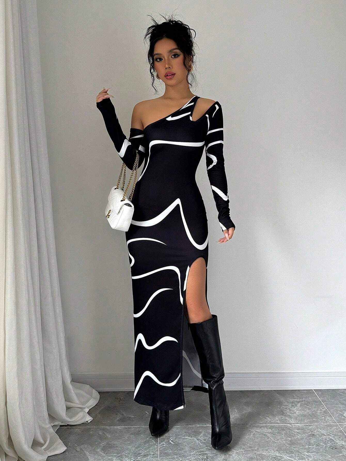 Black off-shoulder maxi dress with white abstract wave pattern, long sleeves, front slit