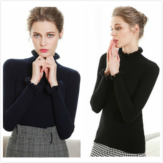 Women's black knit mock turtleneck sweater with ruffled collar, slim fit