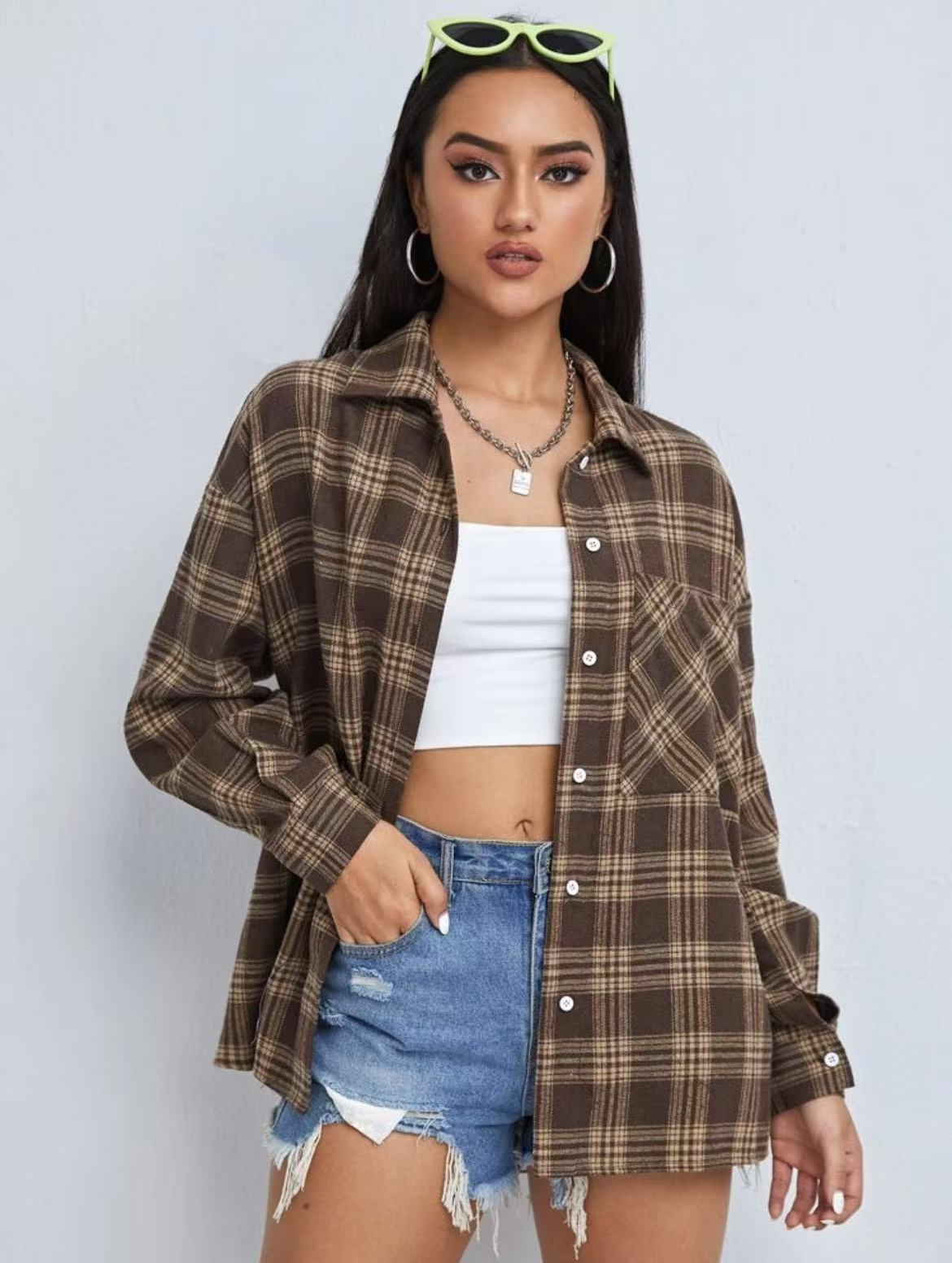 Brown plaid long-sleeve shirt jacket with button front, turn-down collar, chest pocket.