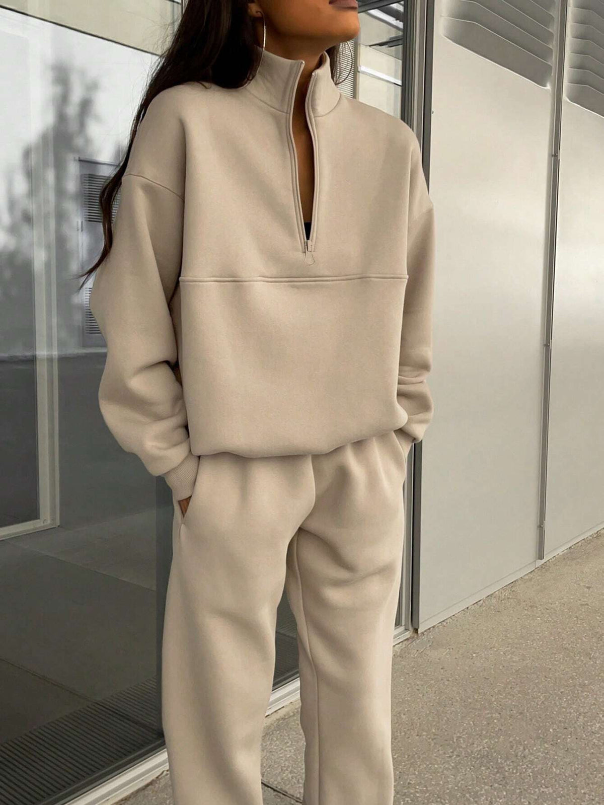 Beige zip-lapel two-piece tracksuit set with quarter-zip pullover and cuffed joggers