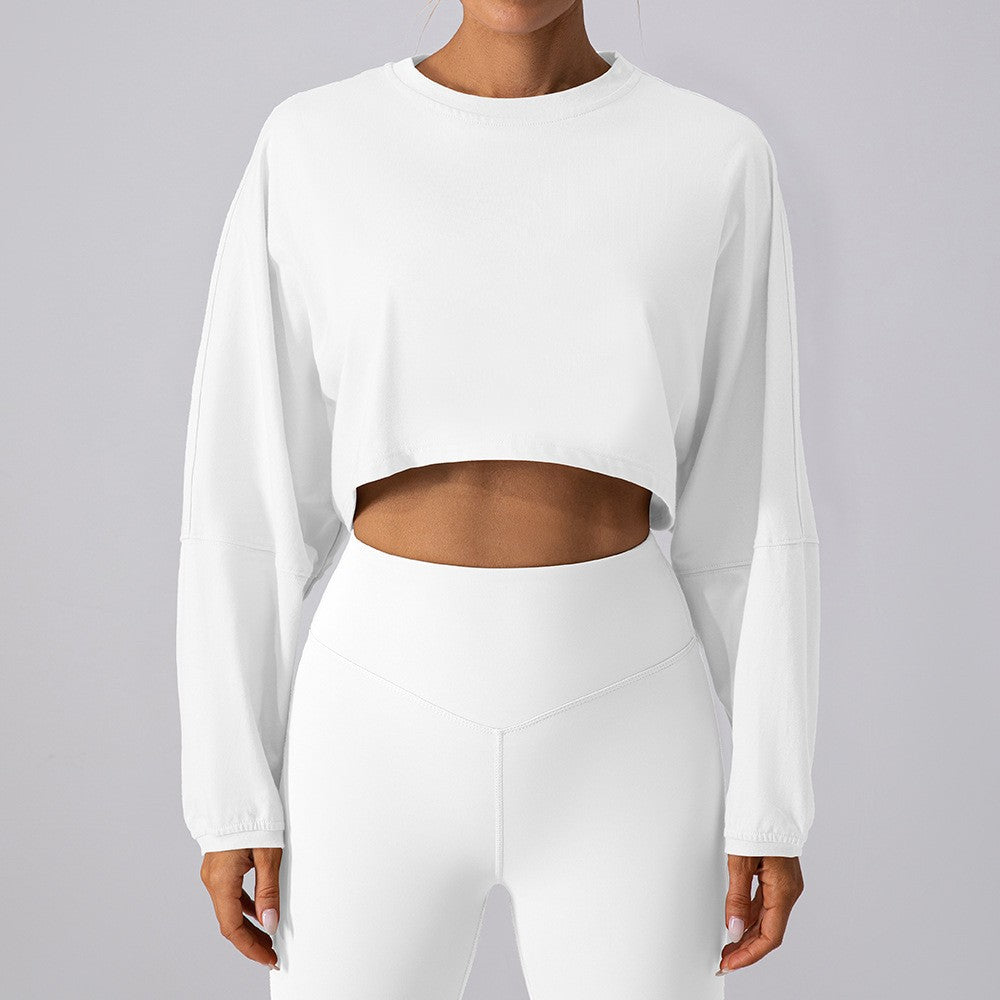 Women's white cropped sweatshirt with crew neck, long sleeves, loose relaxed fit