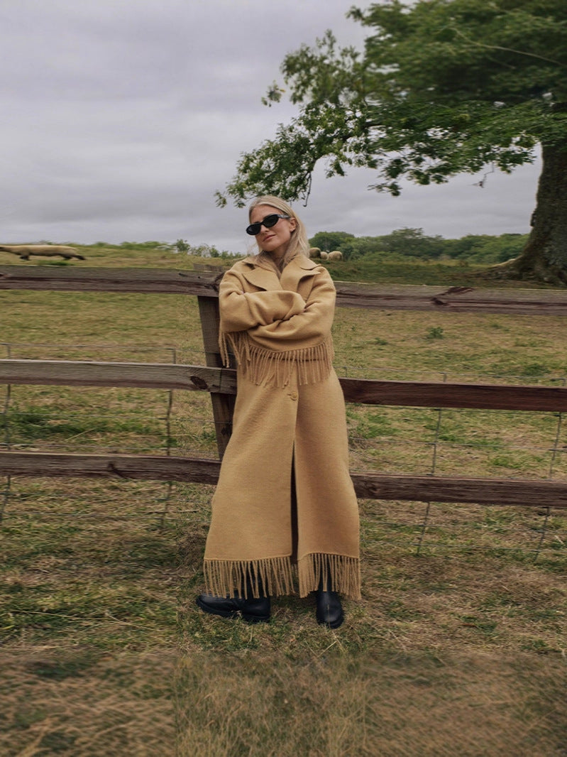 Women’s khaki long windbreaker coat with lapel collar and tassel fringe hem