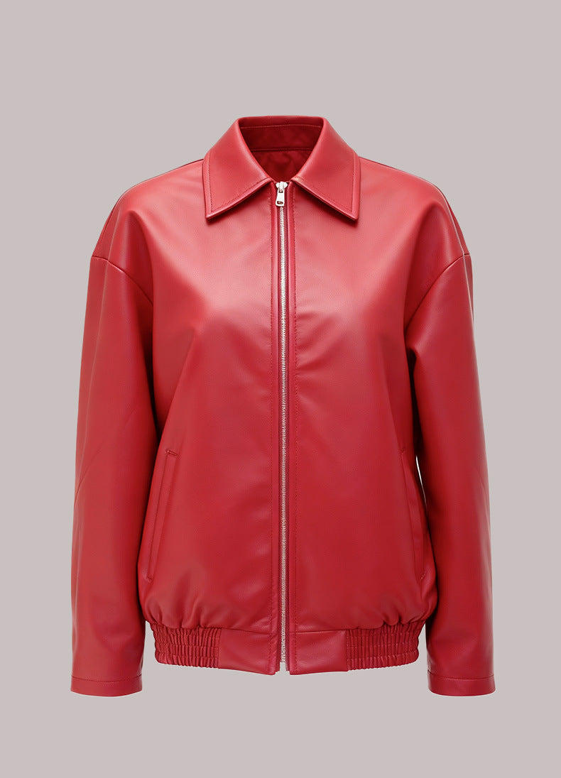 Women’s red faux leather zip-up jacket with pointed collar and ribbed hem cuffs