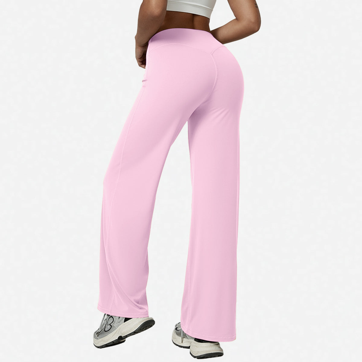 Pink high-waisted wide-leg yoga pants with a rear seam