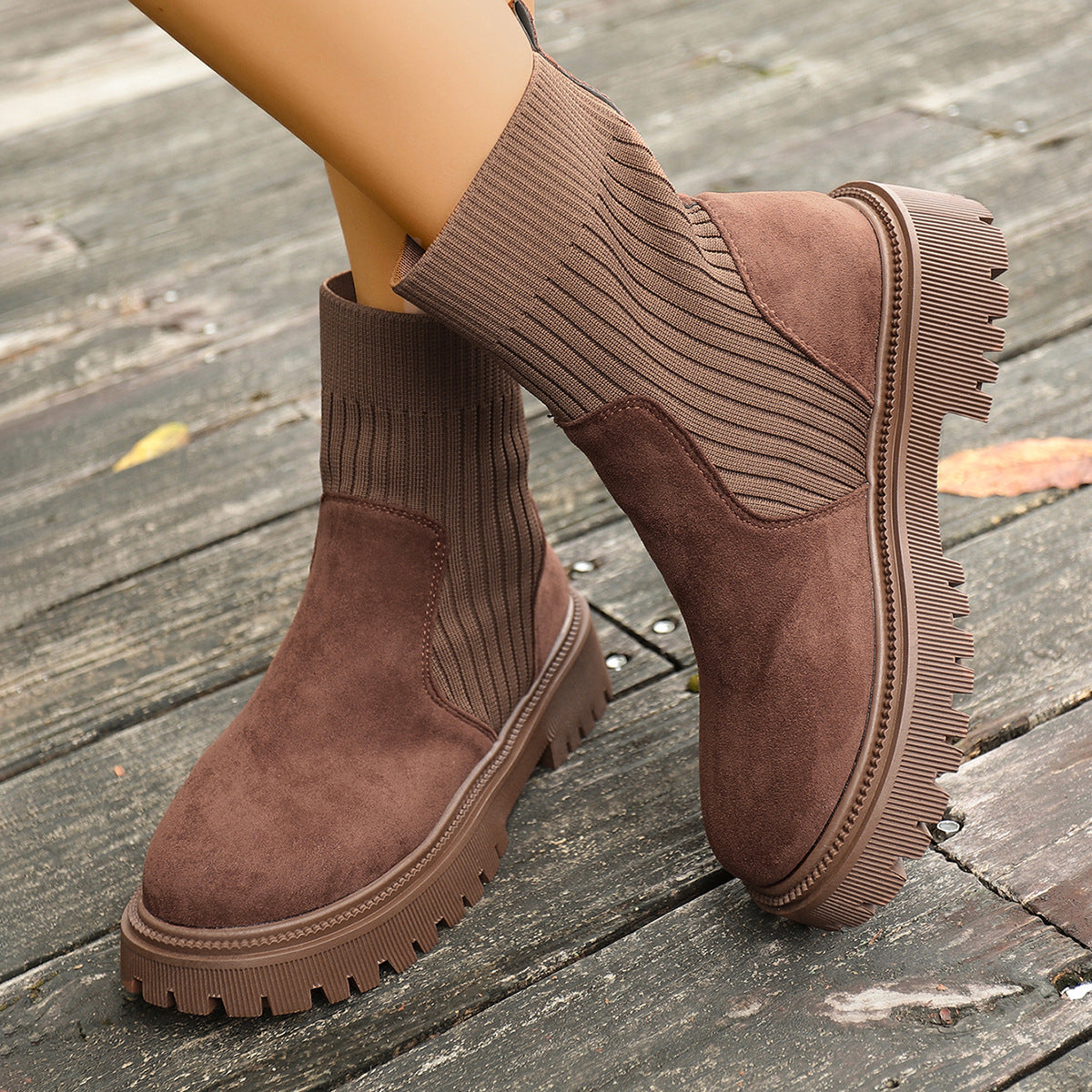 Brown knit sock short boots with suede upper and thick textured lug sole