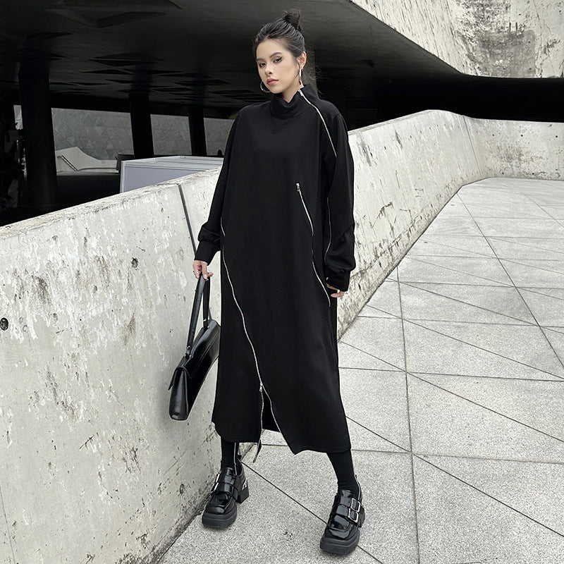 Black knit midi dress with funnel neck and asymmetric front zip, long sleeves, side slit