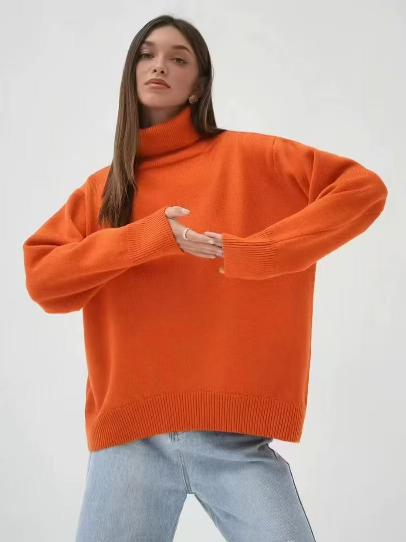 Oversized orange turtleneck sweater with ribbed hem and drop-shoulder sleeves