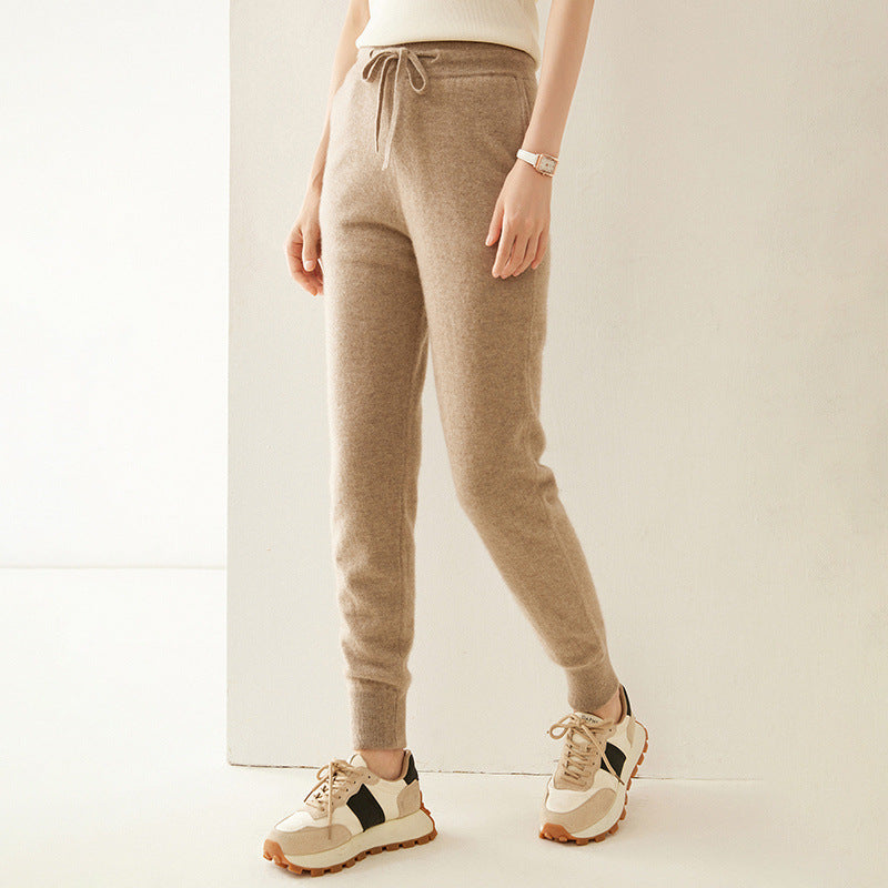 Khaki cashmere-knit jogger pants with drawstring waist and tapered slim legs
