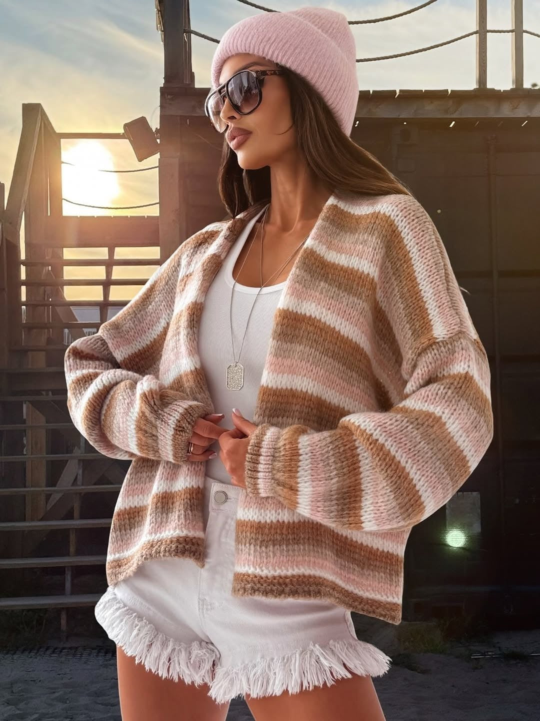 Striped knit sweater in beige with round neck and long sleeves, loose fit