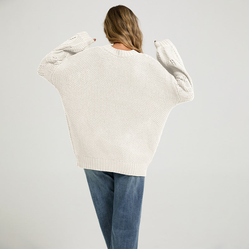 Cream open-stitch sweater with long sleeves and dropped shoulder, back view