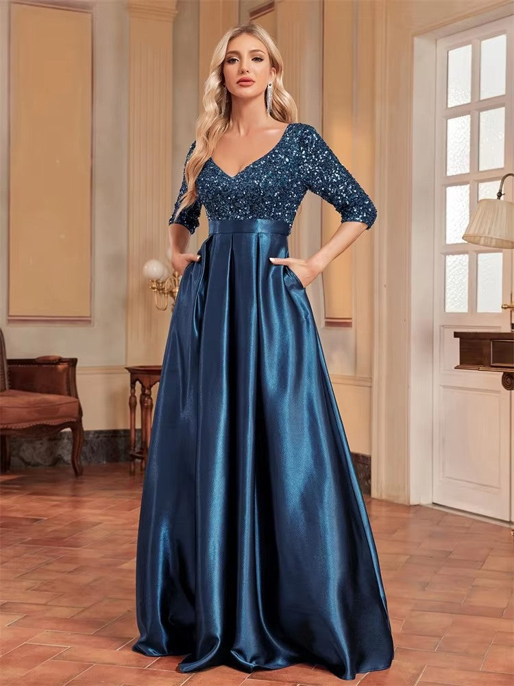 Blue V-neck sequin evening dress with satin flared skirt, three-quarter sleeves