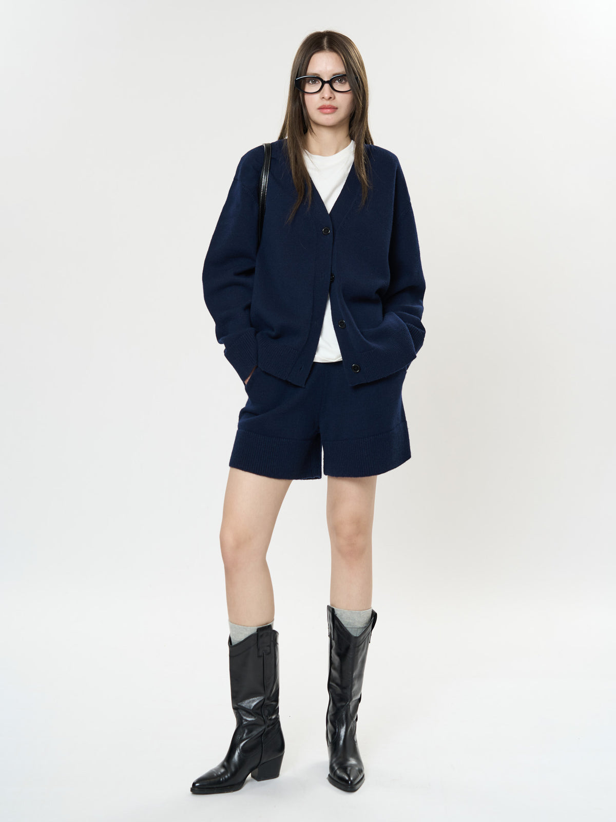 Women's wool knit V-neck cardigan, navy button-front with ribbed hem and cuffs