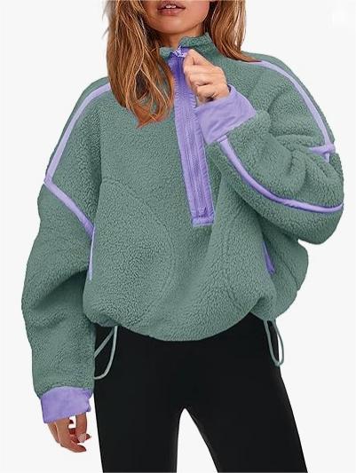 Plush quarter-zip sweatshirt in green with lavender trim and pull tab
