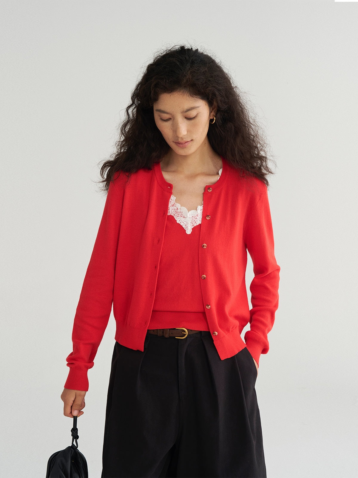 Women’s red knit vest-coat set with button front and lace-trim camisole