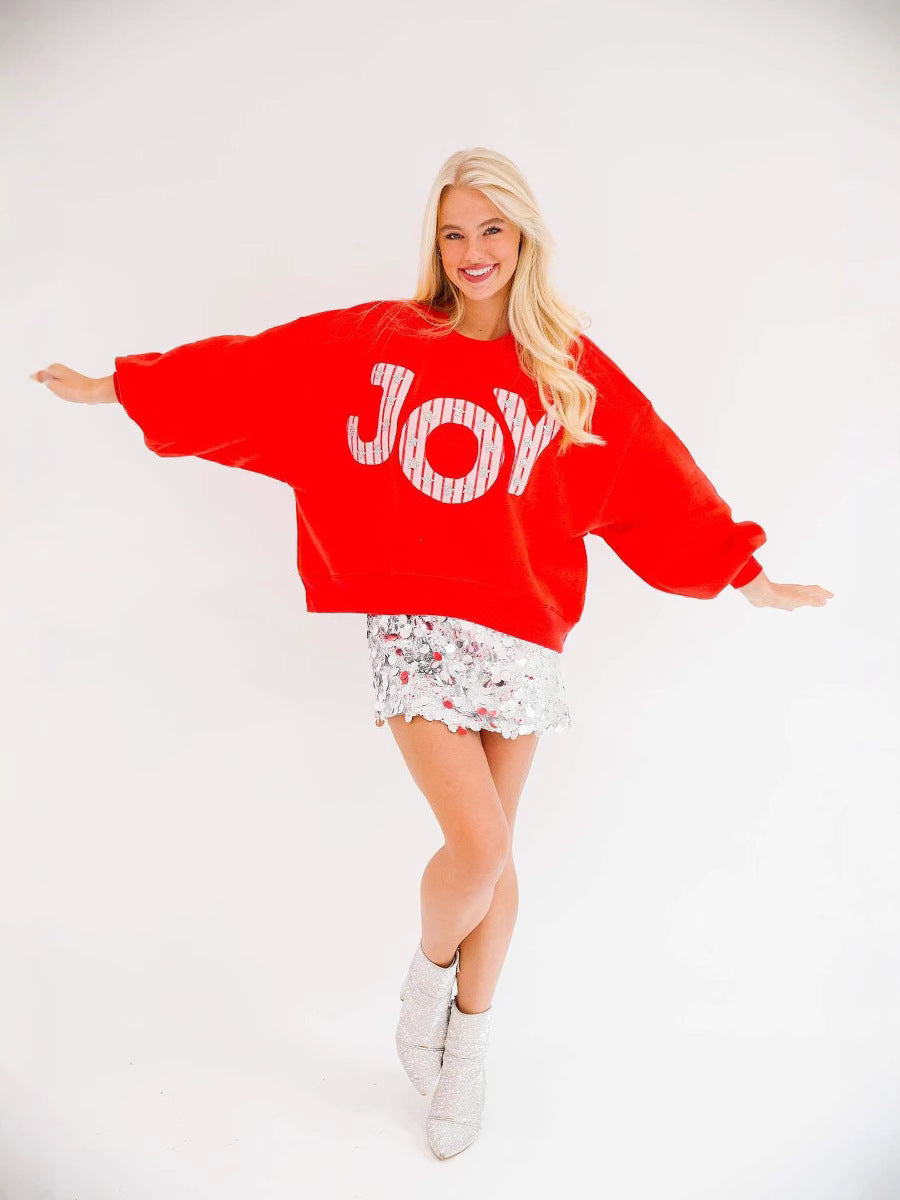 Red women's knitted pullover with multicolor letter graphic and long sleeves