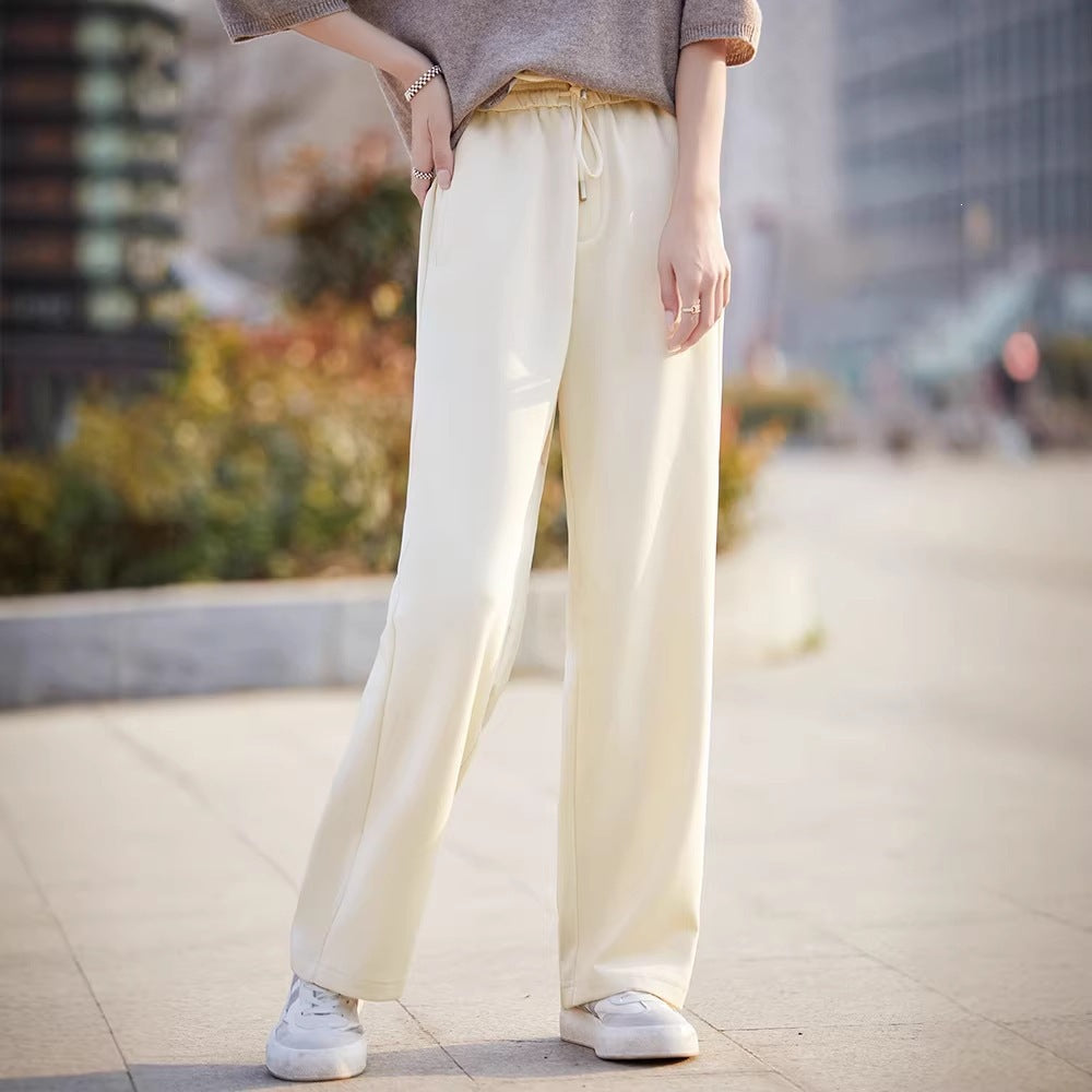 Women’s off-white wide-leg pants with elastic waist and drawstring, loose straight fit