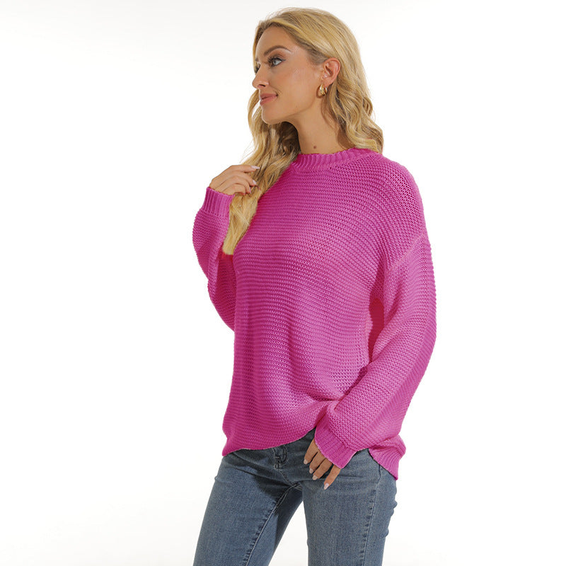 Women’s rose red knit pullover sweater with crew neck, long sleeves and ribbed cuffs