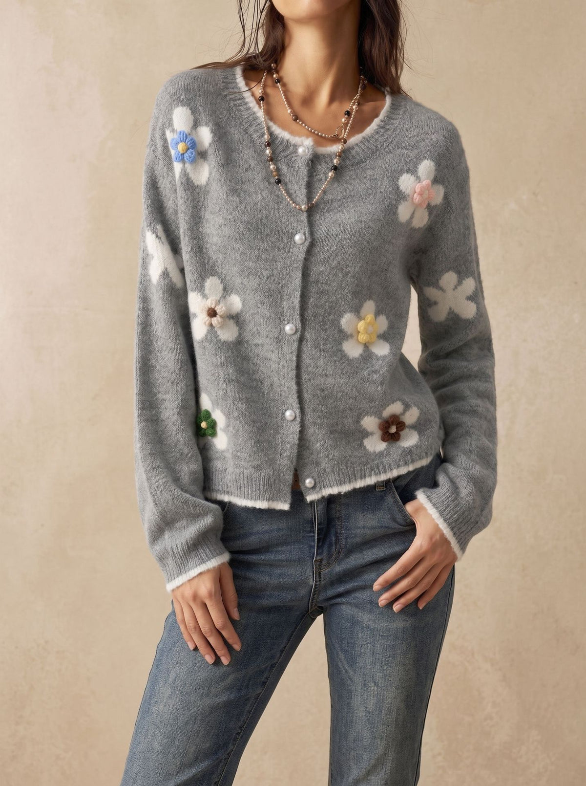 Women’s gray knit cardigan with 3D floral appliques and button front, long sleeves