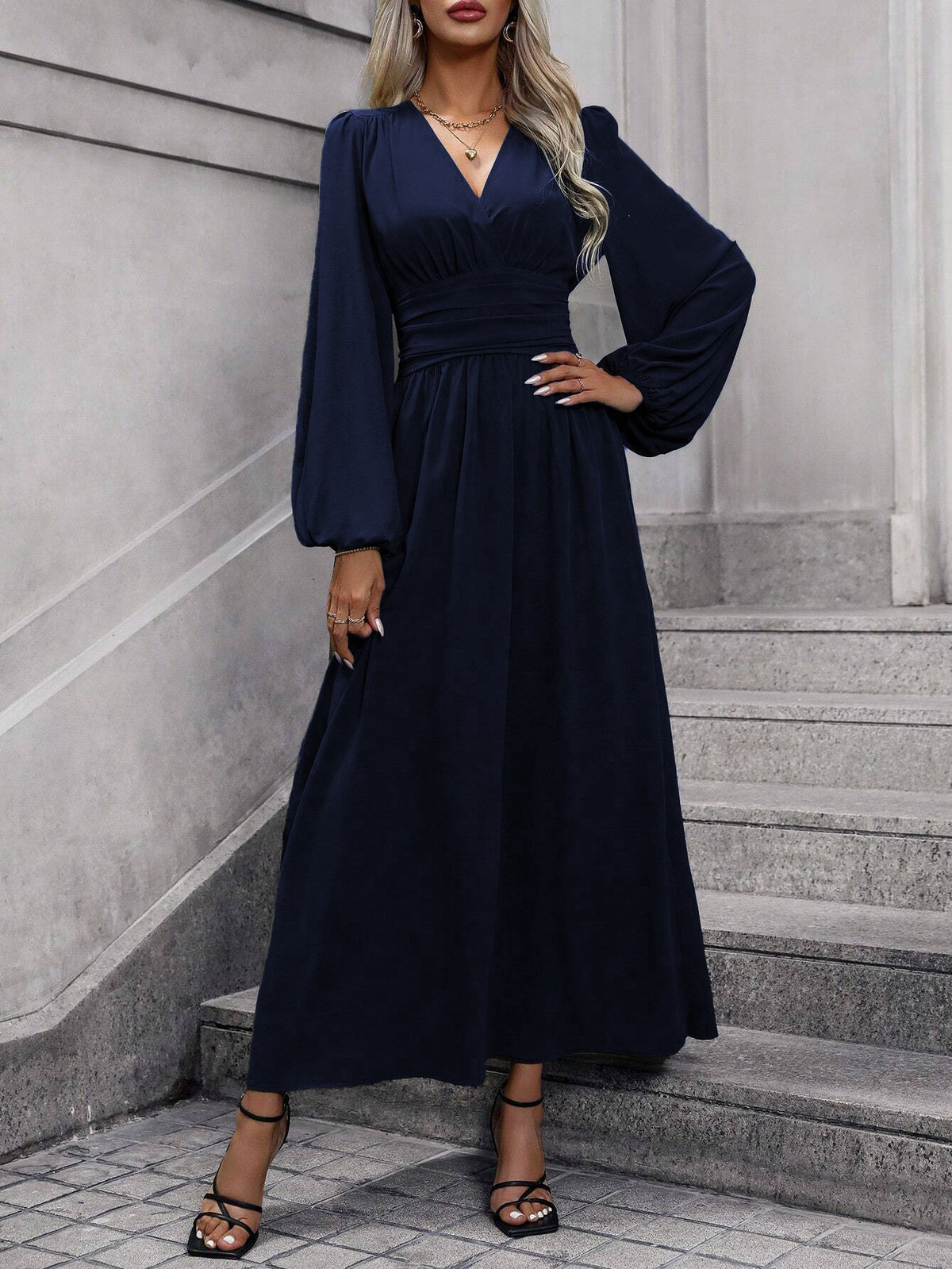 Navy long-sleeve surplice V-neck midi dress with gathered waist and pleated skirt
