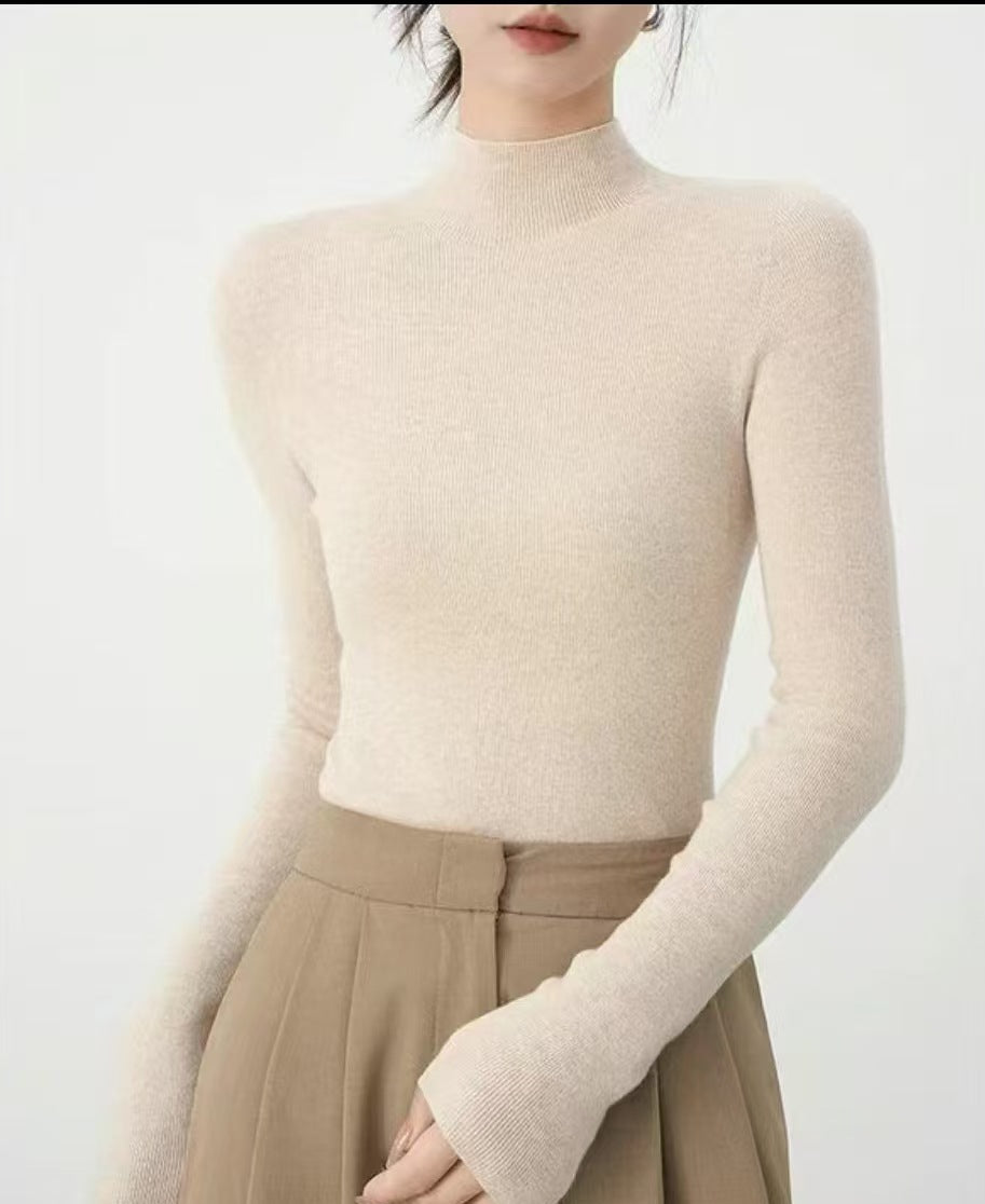Beige women’s mock neck slim-fit long-sleeve knit top, fitted
