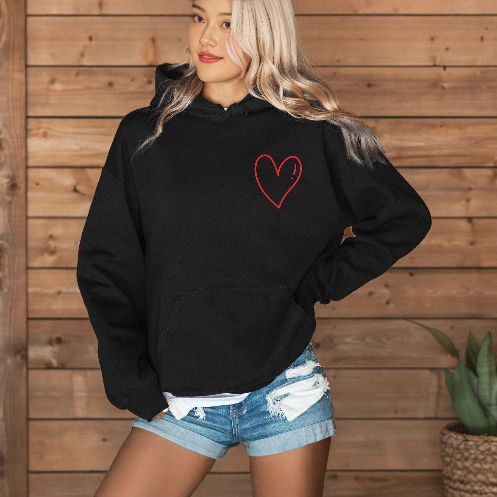 Black minimalist heart hoodie with red outlined heart emblem