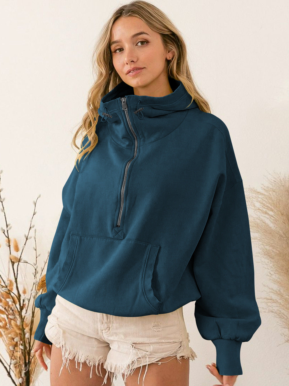 Navy blue hooded zip sweatshirt with drawstring and front kangaroo pocket