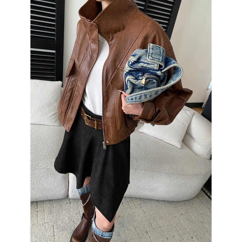 Brown PU leather stand-collar jacket with zipper front and flap pockets