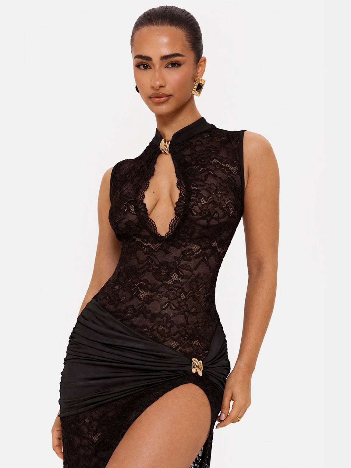 Black lace long dress with sleeveless high neck, plunging front and ruched side slit.