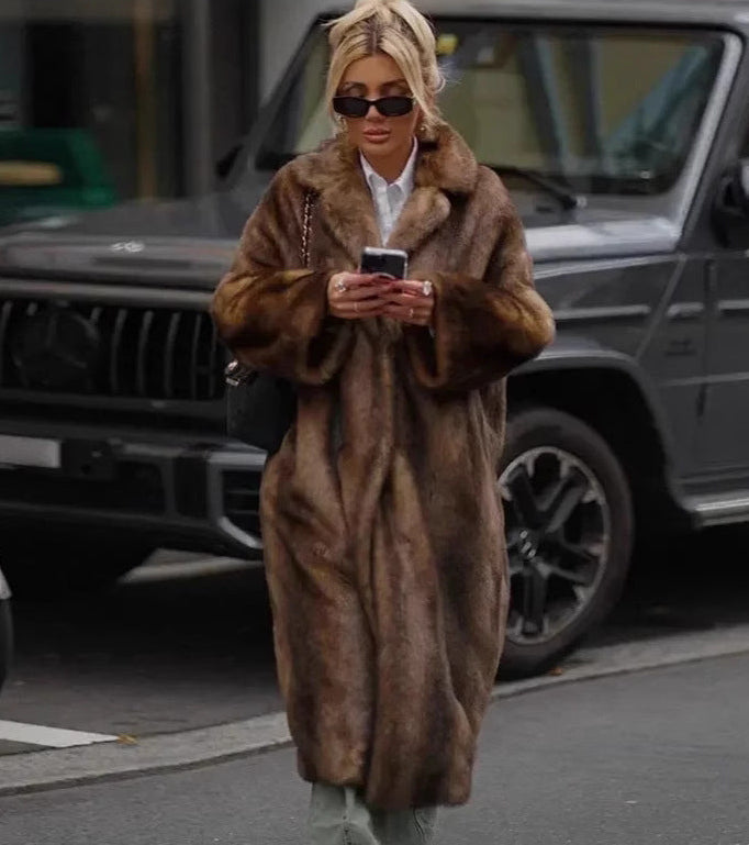 Women's brown faux fur maxi coat with oversized collar and long sleeves