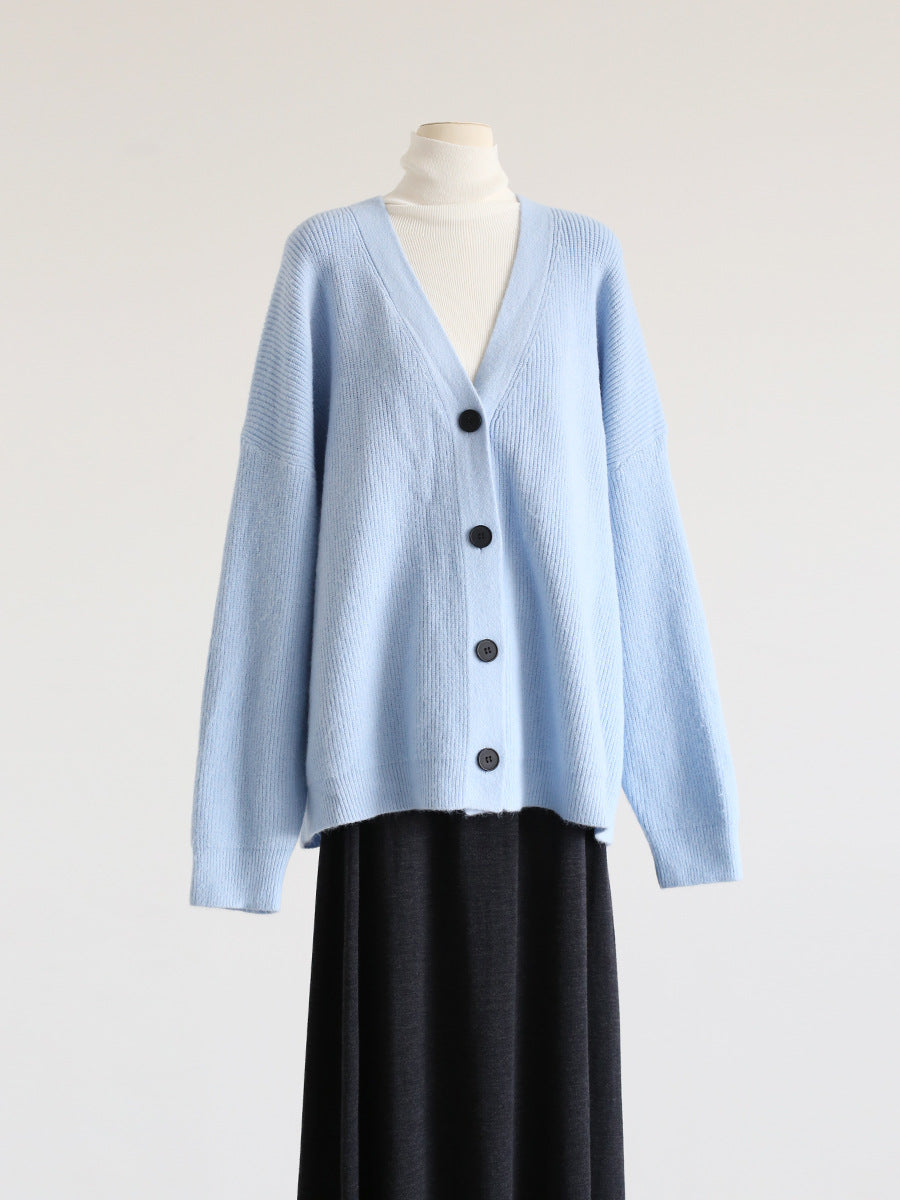 Light blue V-neck mohair cardigan with V-neck, button front, and drop shoulders