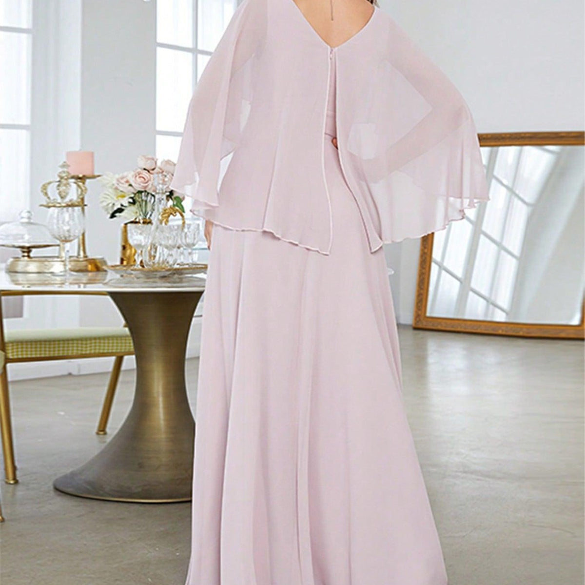 Light pink V-neck chiffon evening dress with cape sleeves and gathered waist