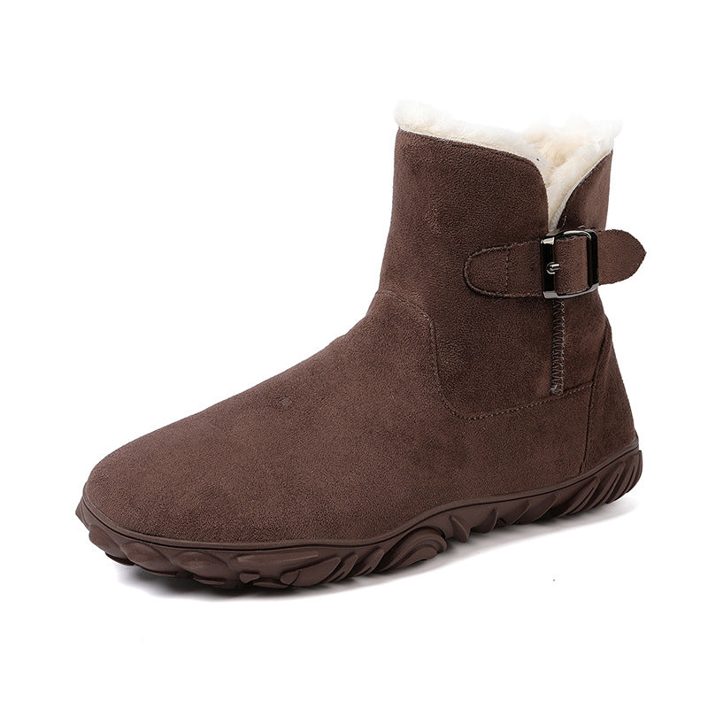 Brown flat ankle snow boot with faux fur trim, side buckle strap, textured rubber sole