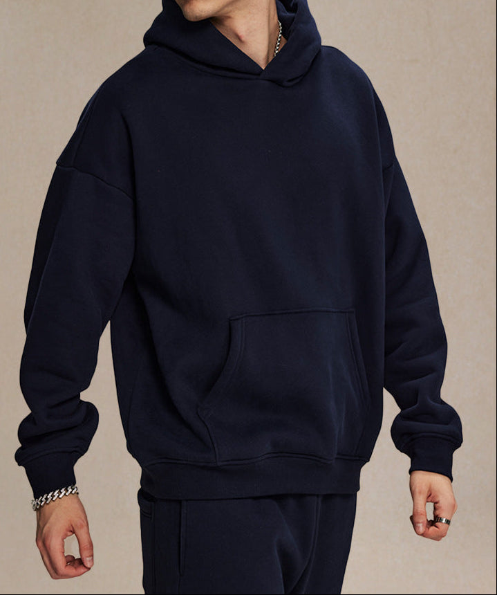 Women's navy hoodie and sweatpants set with pullover hood and front kangaroo pocket