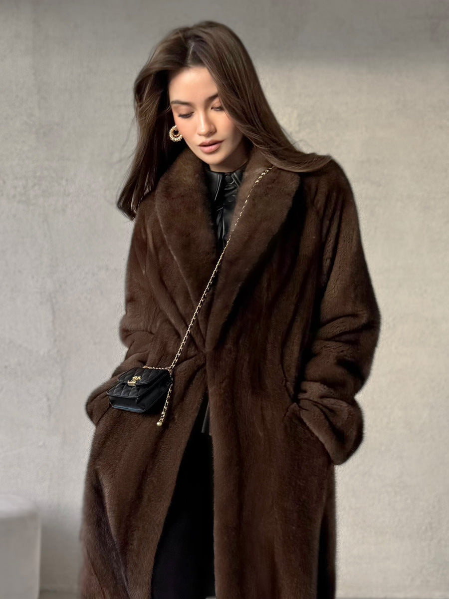 Dark brown long faux fur coat with open front and plush collar