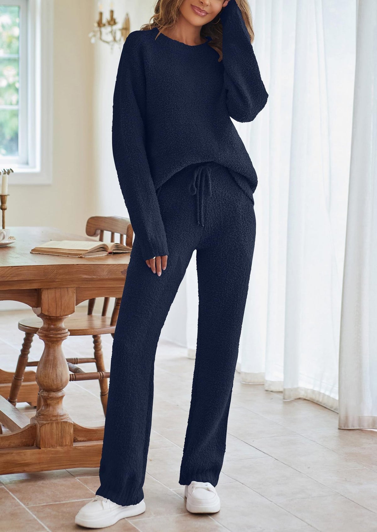 Navy knit lounge set with long sleeves, round neck top, and drawstring wide-leg pants