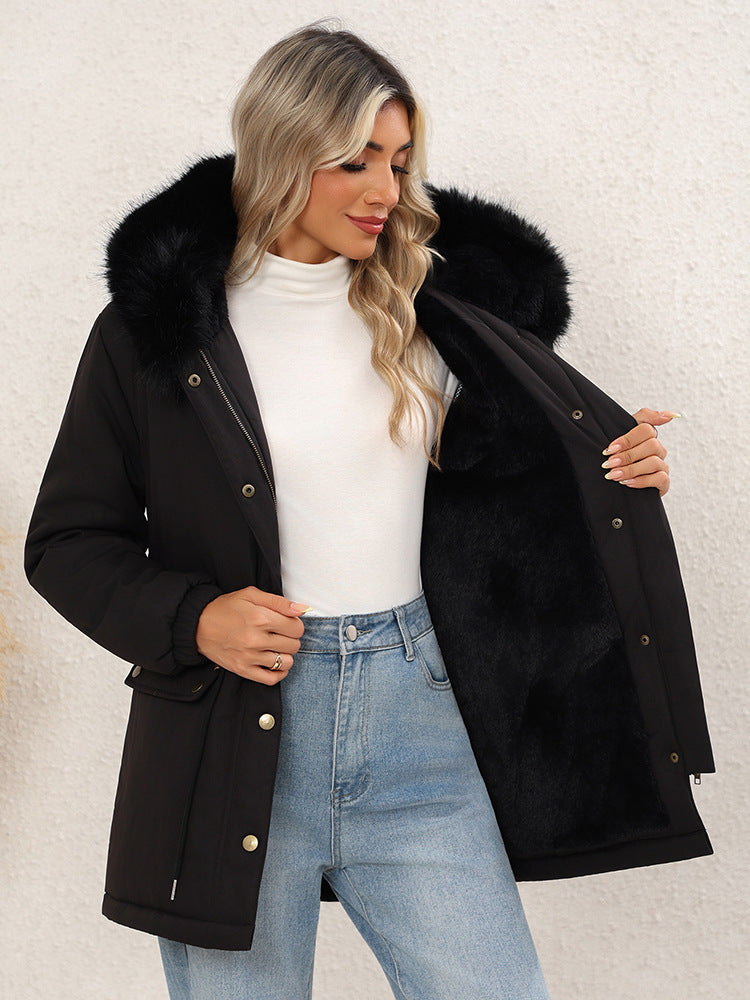 Women's black mid-length hooded parka with faux-fur trim, button front, drawstring waist, side pockets