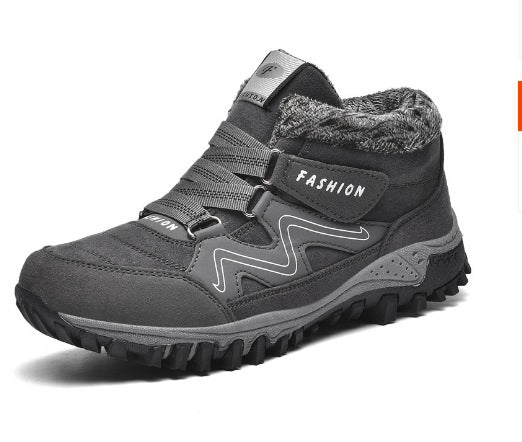 Dark gray winter snow boots with faux fur lining, strap closures, and rugged outsole