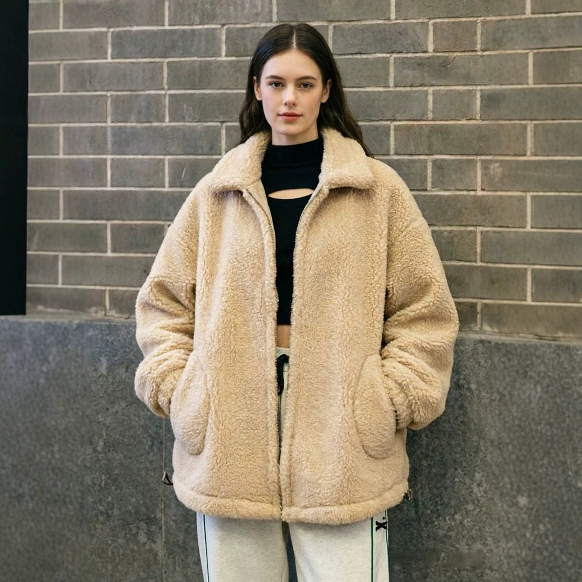 Women’s beige sherpa zip-up faux lamb wool coat with stand collar and front zipper