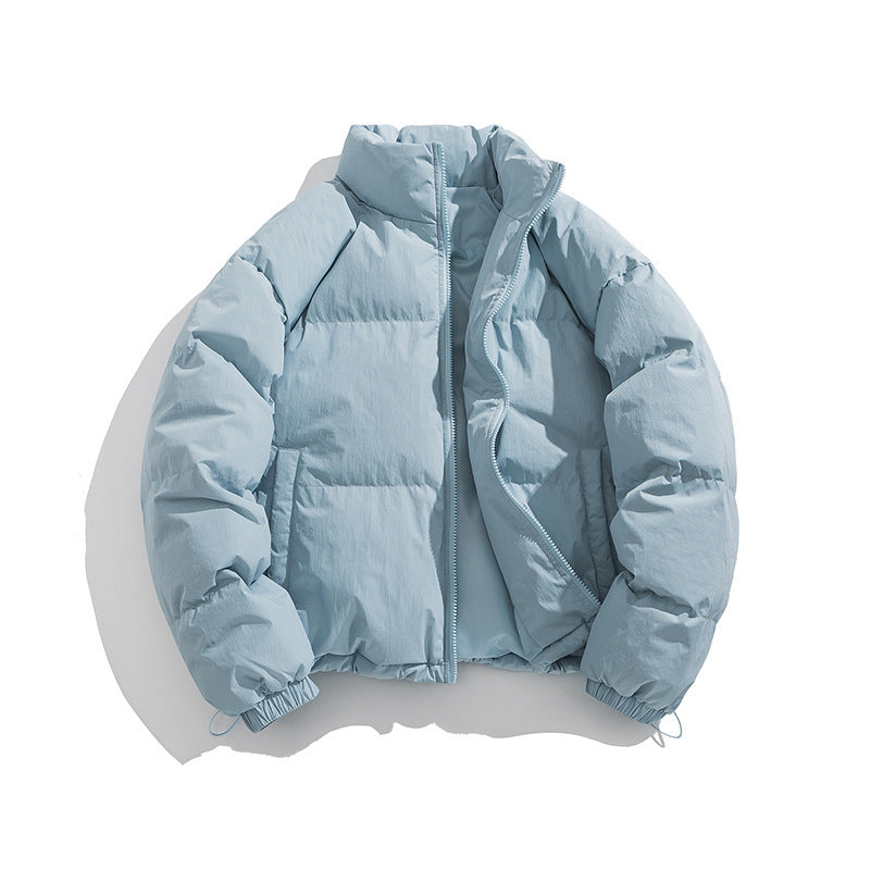 Light blue insulated puffer jacket with stand collar and front zipper.