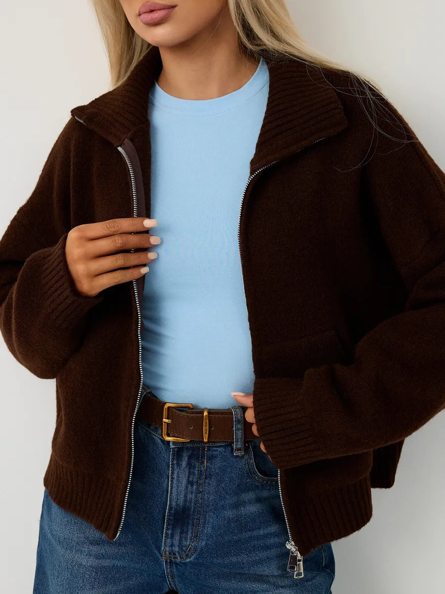 Women’s brown knitted zip-up cardigan with stand-up collar and zipper pockets