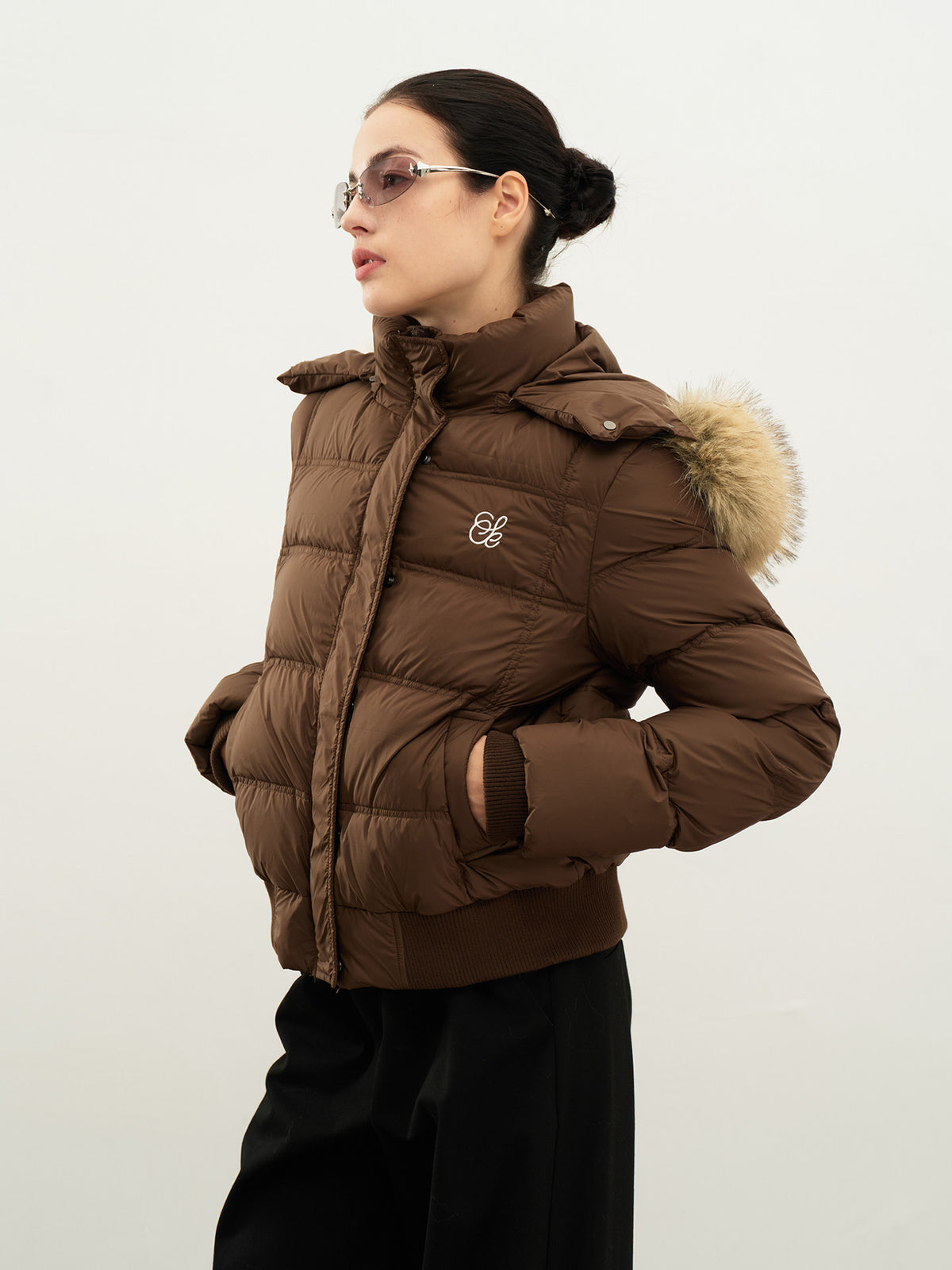 Women's brown hooded puffer jacket with faux-fur trim, zip front, long sleeves