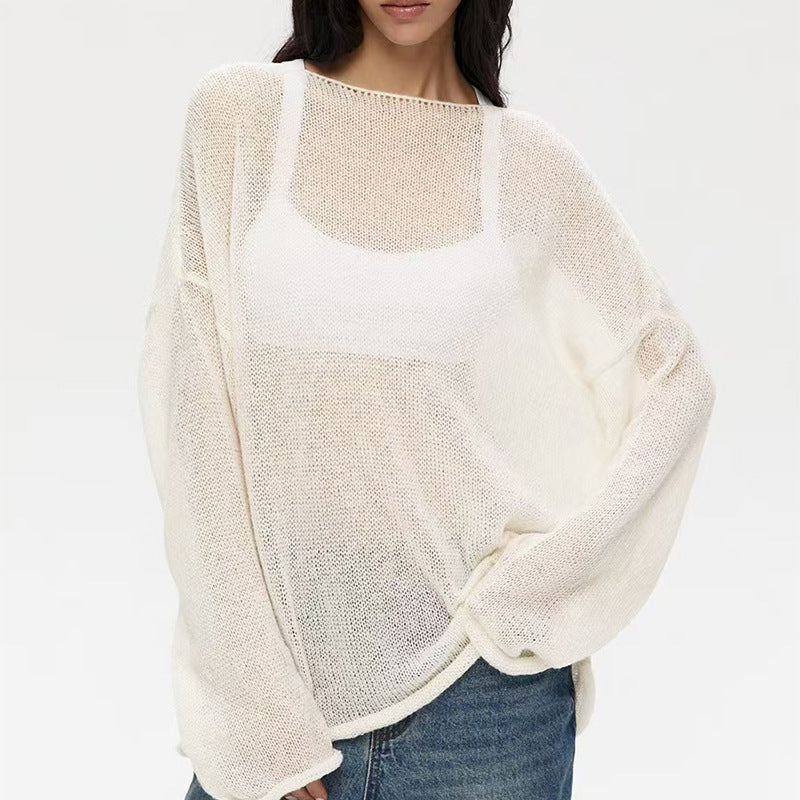 Ivory women’s loose knit sweater top with round neck and long sleeves, breathable sheer texture