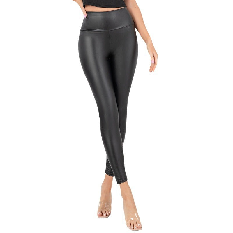 Black high-waisted faux leather leggings, slim fit with ankle-length tapered legs.