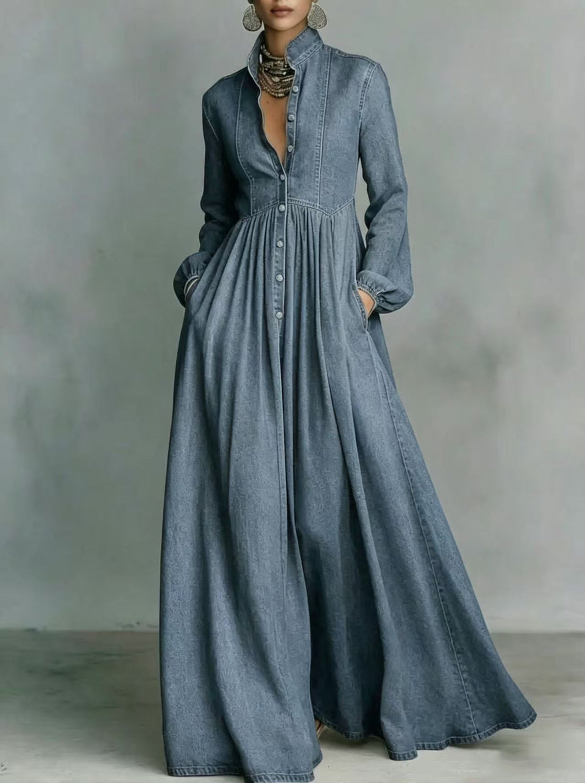 Denim blue long denim maxi dress with V-neck, button front, long sleeves, gathered waist