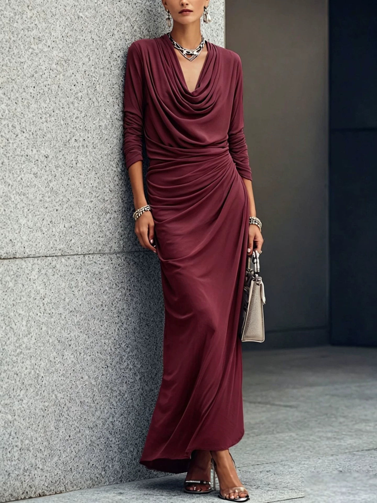 Burgundy long-sleeve draped maxi dress with plunging V-neck and ruched cowl