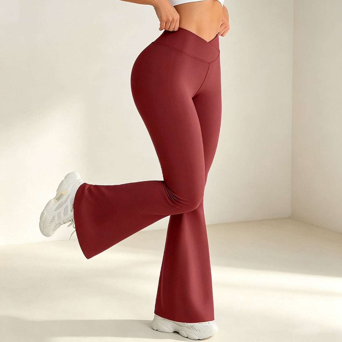 High-waist micro-flare yoga pants, dark red, fitted legs with flared hem