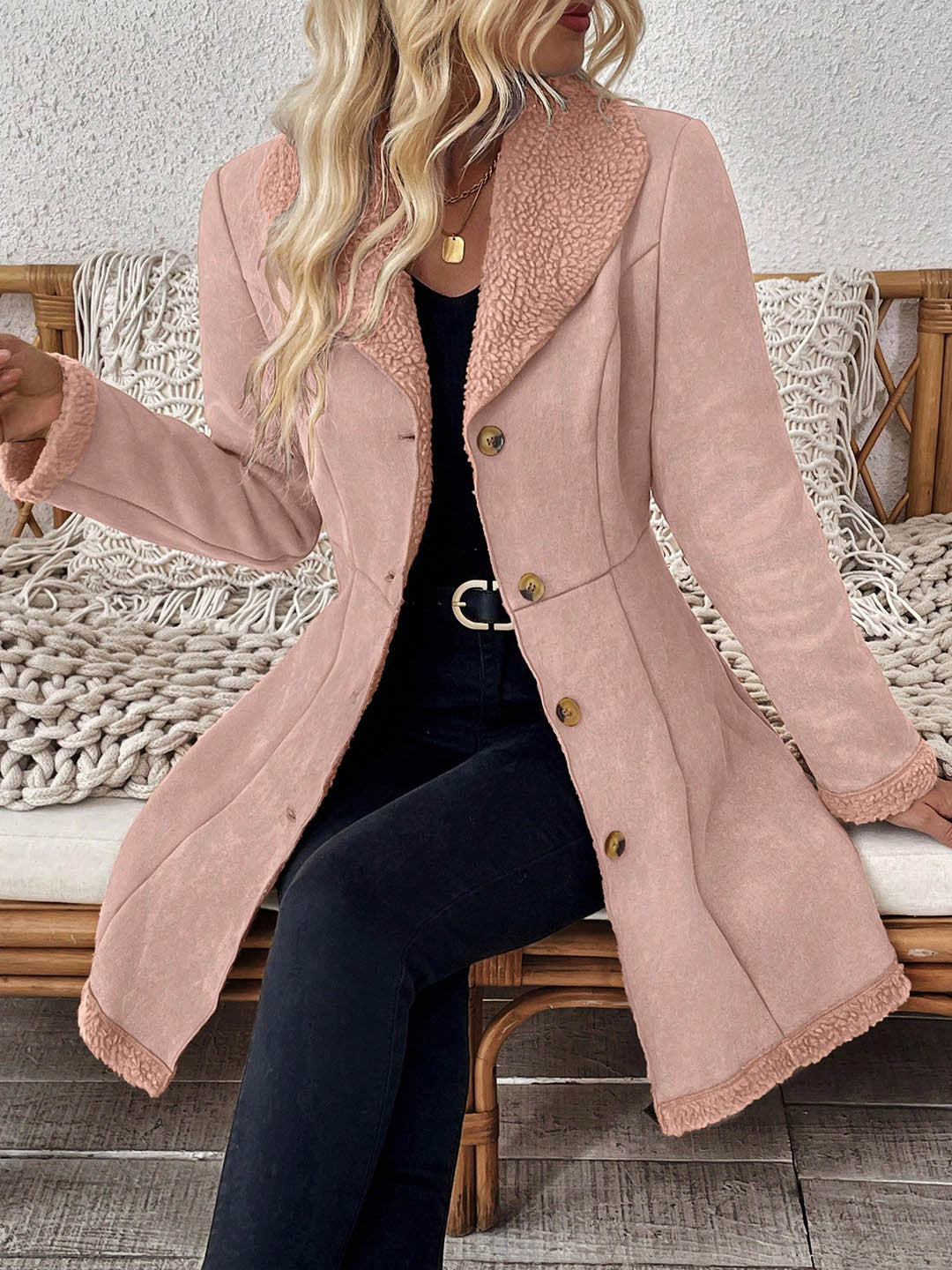 Mid-length mauve suede-look jacket with shearling-trim lapel and button front.