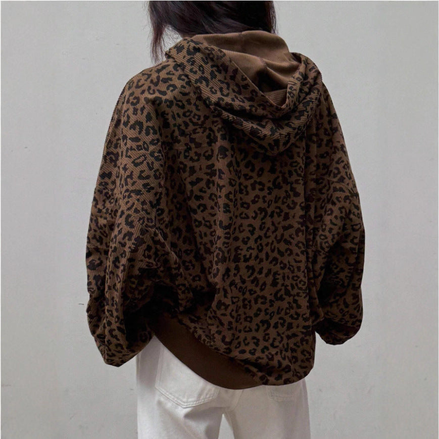 Back view of leopard print cropped hoodie with hood, roomy sleeves, and kangaroo pocket